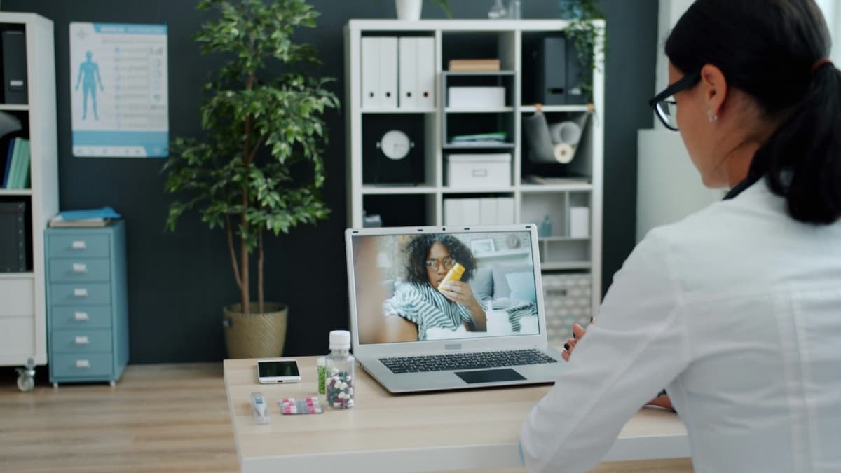 A doctor talking with a patient on a video call